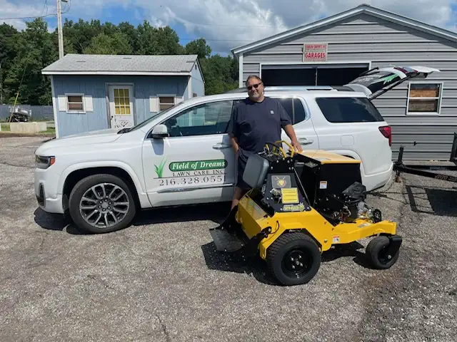 Professional core aeration equipment used by Field of Dreams Lawn Care on Northeast Ohio lawns
